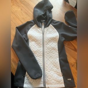 The Glen Club Sunice XS ladies golf  jacket.